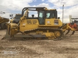 Side of used dozer in yard
